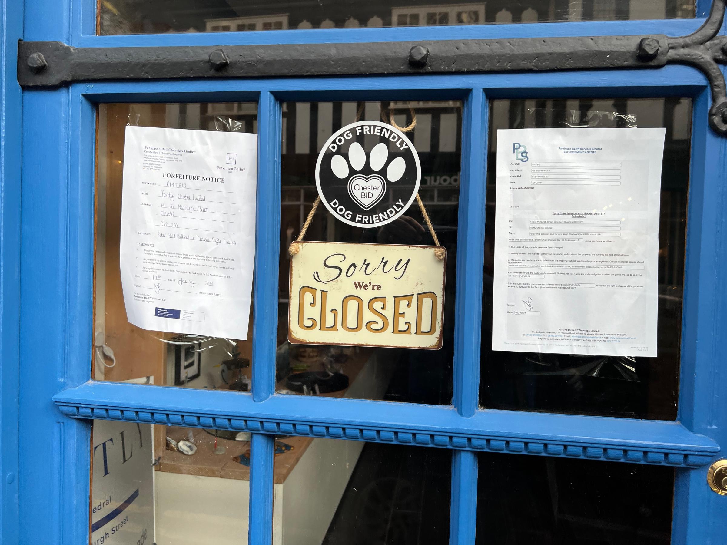 Partly Chesters former store in St Werburgh Street with the bailiffs notice attached.