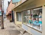 A display that's part of Prosper Portland's Window Stories in an empty storefront on Southeast Hawthorne on Dec. 28, 2023.