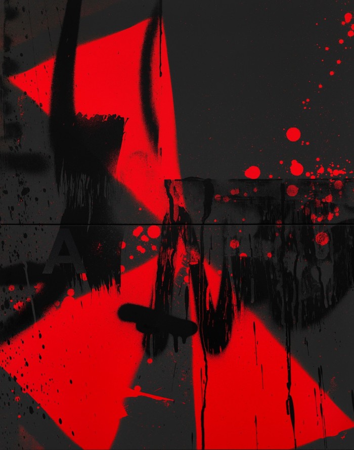 A silkscreen of red triangles on a black background