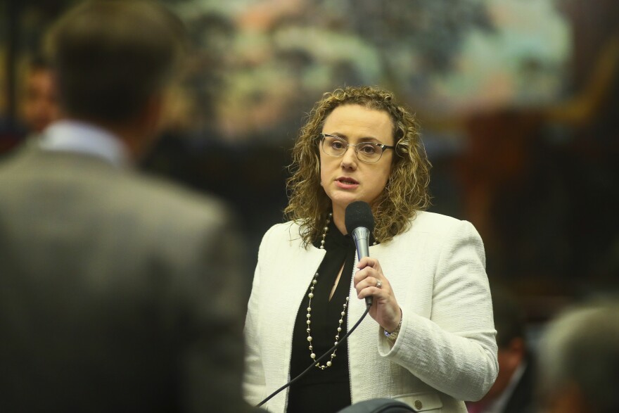 At right, Rep. Erin Grall, R-Vero Beach Rep. asks a question to Jay Trumbull, R-Panama City about his bill titled CS/SB 2-D: Property Insurance in the Florida House of Representatives Wednesday, May 25, 2022 at the Capitol in Tallahassee, Fla. The bill passed 95-14. (AP Photo/Phil Sears)