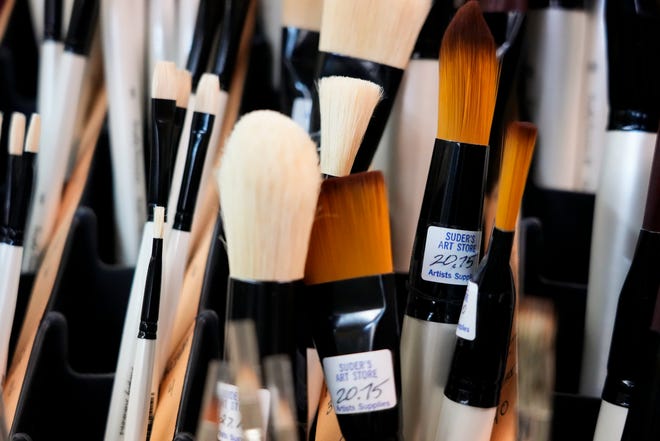 Dozens of brushes are unmarred and pristine, waiting for painters to buy them for future projects on Tuesday, Jan. 16, 2024, at Suder’s Art Store in Over-the-Rhine.