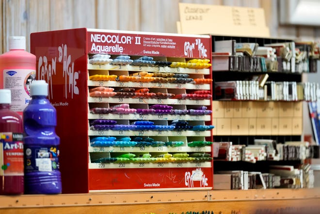 A variation of colored art wax crayons are available for purchase on Tuesday, Jan. 16, 2024, at Suder’s Art Store in Over-the-Rhine. The business celebrates its centennial this year.