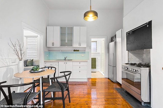 Construction on the home completely brought the living spaces up-to-date, with the couple adding an open-plan design and new kitchen