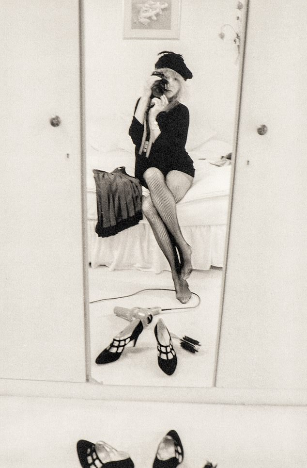 Boyd became a photographer after giving up modelling