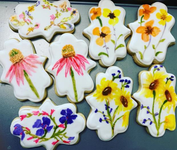 Hand-painted flower cookies made by Cameron Livesay. (Patrice Stair photo)