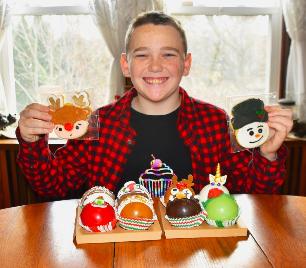 Cameron Livesay is pictured with his chocolate bombs and cookies. (Lyndi McNulty photo)