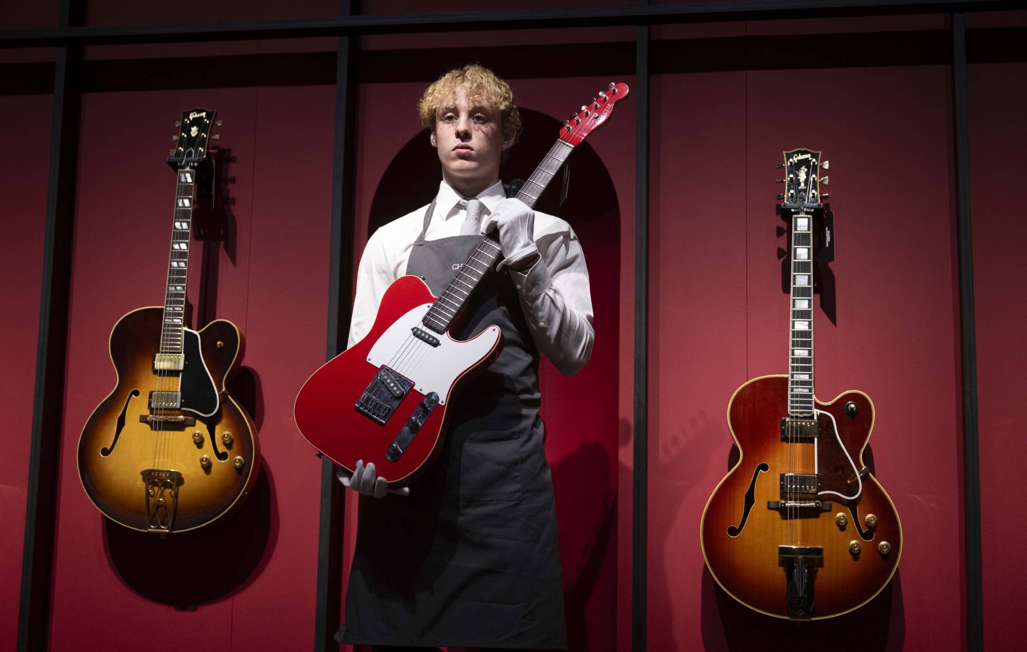 Guitars, owned and used by musician Mark Knopfler, are displayed during the press preview ahead of sale of his collection at the Christie's auction house in London, United Kingdom on January 18, 2024. Christie's is set to auction over 120 guitars and amplifiers from the illustrious 50-year career of the renowned lead guitarist, singer, and songwriter of the British band Dire Straits. (Photo by Rasid Necati Aslim/Anadolu via Getty Images)