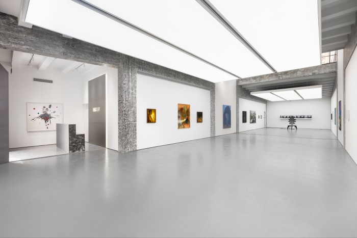 A large white gallery space for displaying art