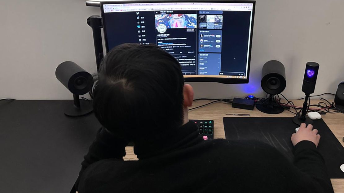 A photo provided by Li shows him in front of a computer