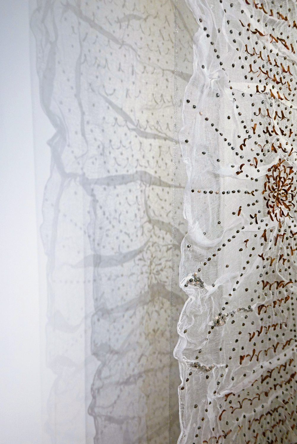 A close-up of 'Seed Constellation', an intricate mixed media piece by Syarifah Nadhirah. Photo: Handout