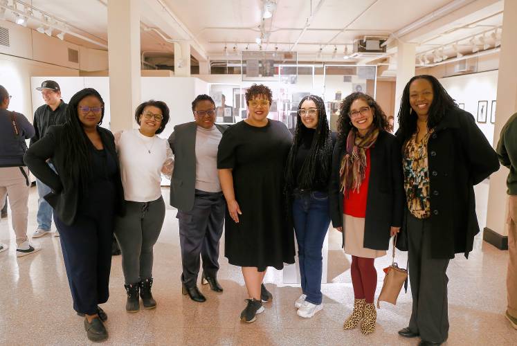 UMass Fine Arts Center director Jamilla Deria, from left, Kandy G Lopez, curator Juana Valdes, Adrienne Chadwick, Sydney Rose Maubert, Mari Castaneda, and Yolanda Covington-Ward enjoy a reception at “As We Move Forward” at the Augusta Savage Gallery.