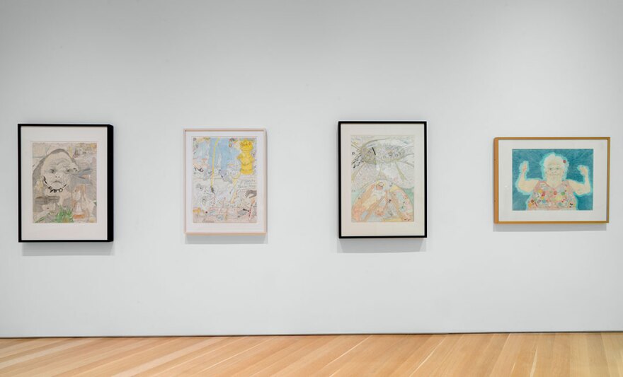 Four framed rectangular art works by Elizabeth Layton displayed on a white wall. 