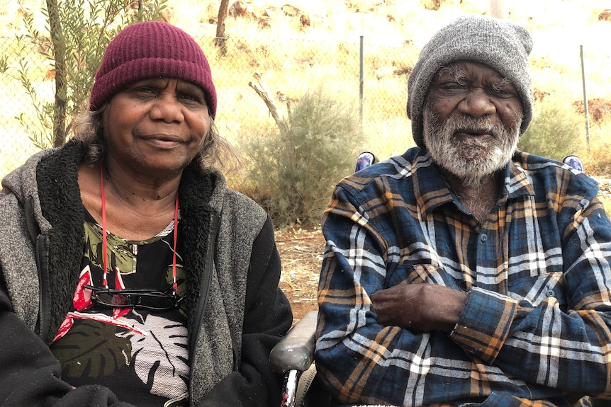 a man and woman smiling together