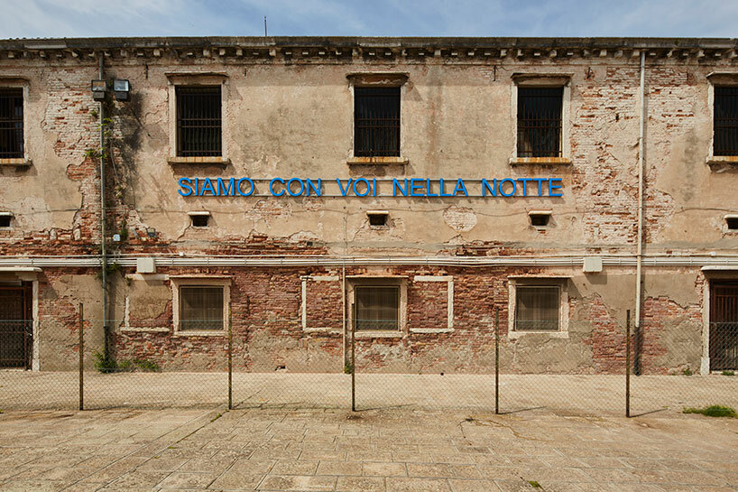 the vatican pavilion takes shape within a functional women's prison at the venice art biennale