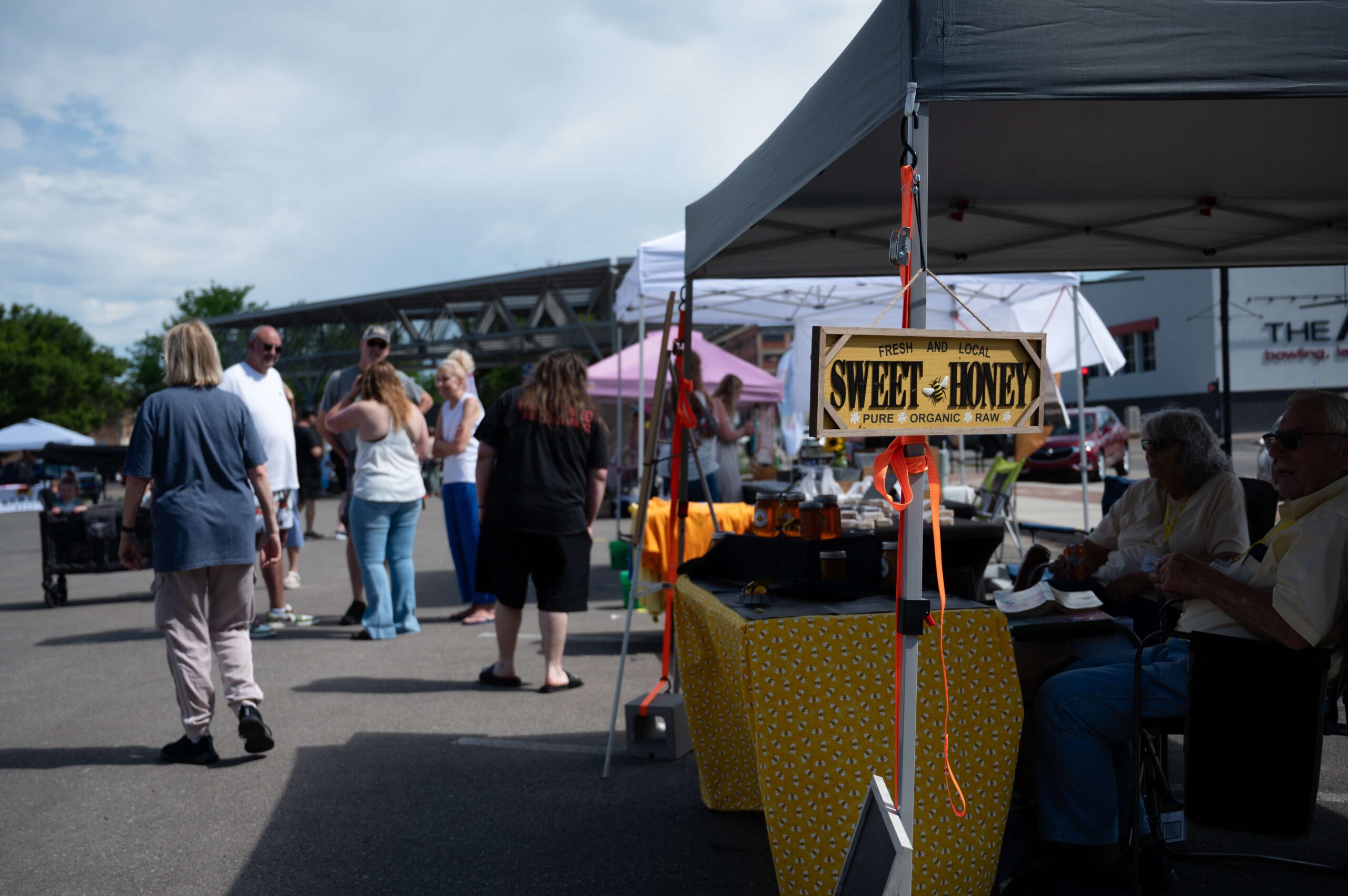 Shoppers browse the local food and goods at the first Farm and Art Market Downtown on Saturday, May 18, in downtown Salina. <b>Photo by Olivia Bergmeier</b>