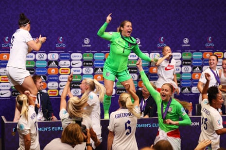 Lucy Bronze and Mary Earps dance on the press conference table during an impromptu celebration following the Lionesses’ 2-1 victory against Germany in the Euros, 2022.