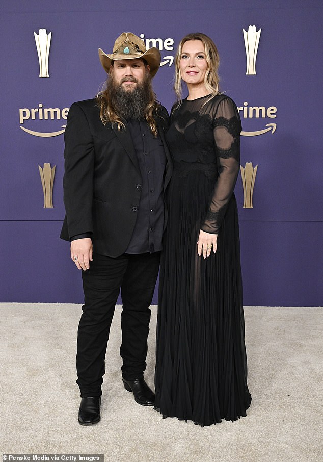 Chris Stapleton took home the honors for Male Artist of the Year. Pictured with wife Morgane Stapleton during entrances