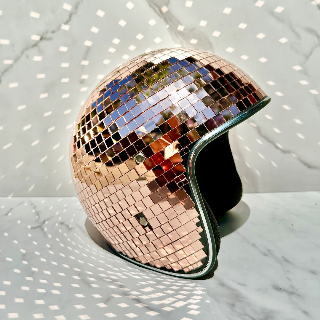 A fashion helmet adorned with mirror mosaic for sale