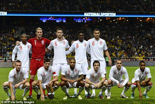 Caulker (back row, furthest right) pictured ahead of England's friendly against Sweden in 2012