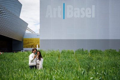 Visitors take a selfie in front of the installation 