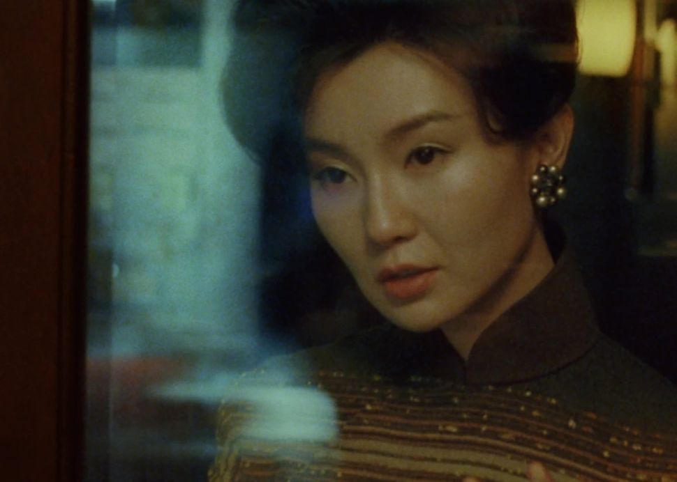 Film frame featuring an asian woman in the darkneesss