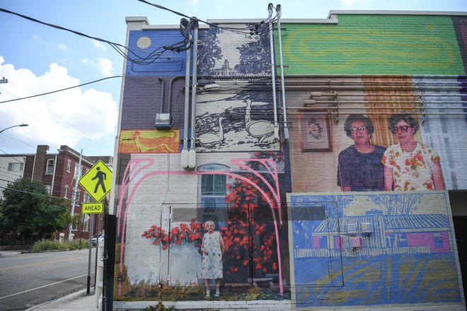 A mural by artist Pat Perry adorns a building wall for KnoxWalls at Emory Place in Knoxville, Thursday, August 15, 2024. The immersive joint art collaboration from artists based nationwide will open to the public in Knoxville on Friday, Oct. 4.