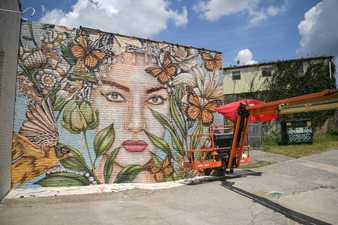 A mural by Juan Manuel Rozas of Miami is part of the KnoxWalls at Emory Place project in Knoxville, Thursday, August 15, 2024. The immersive joint art collaboration from artists based nationwide will open to the public in Knoxville on Friday, Oct. 4.