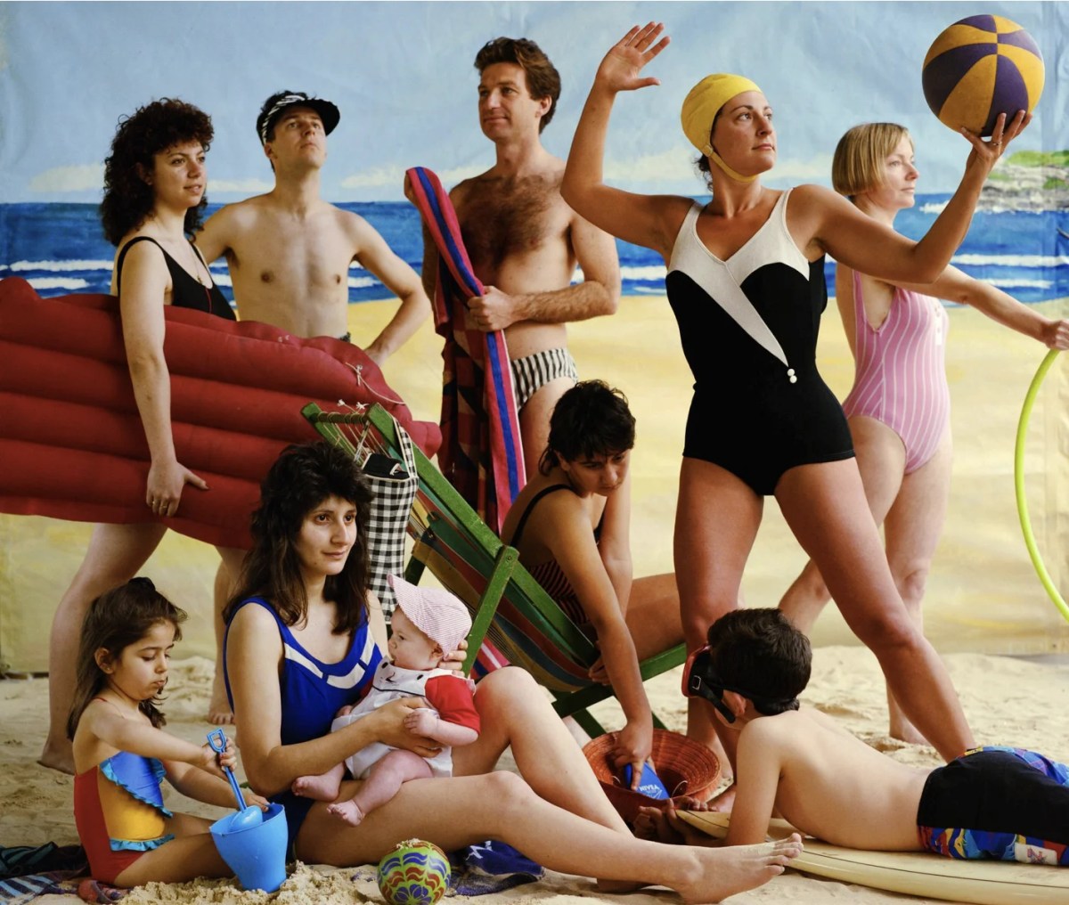 Staged photo of women and children in retro beach setting. Anna Zahalka.