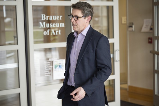 Brauer Museum of Art director and curator Jonathan Canning speaks about the process of deaccessioning art at the museum on Thursday, April 6, 2023. (Kyle Telechan for the Post-Tribune)