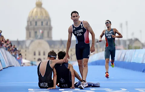 Reuters Hayden Wilde, Alex Yee, Pierre Le Corre and Joao Batista at the finish line of the 2024 Olympics' men's individual triathlon (Credit: Reuters)