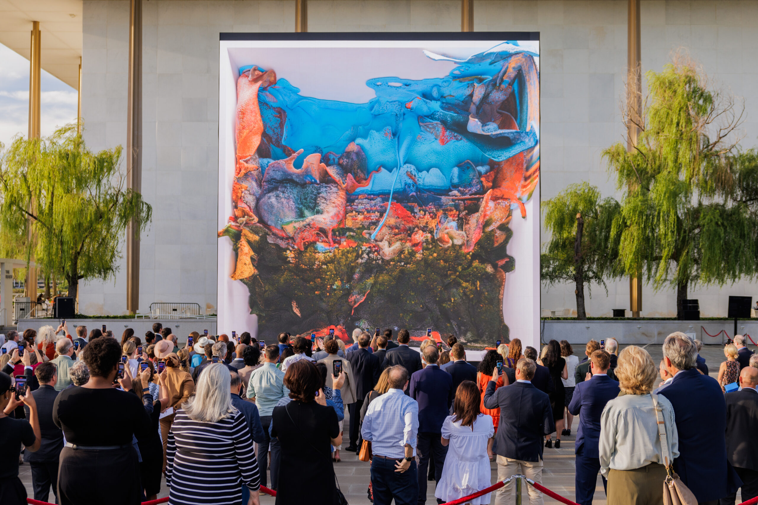 Visitors look towards’ ‘Dvorak Dreams’, a digital installation by Refik Anadol