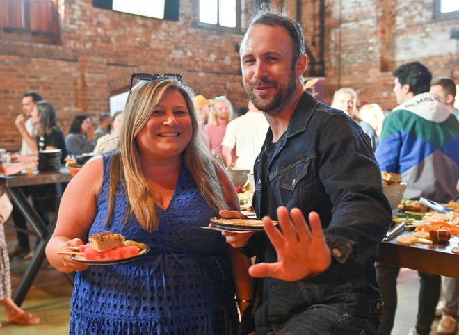 Tabitha Skipper, Joey Thompson at the West End Social networking event at New Realm Brewing Co. in Downtown Greenville. Young professionals in the Greenville area connected with West End business owners and community leaders over delicious food and drink. Partners for the event included RingoFire, TALK Greenville magazine, Modal Coffee & Hostel, Corsica Technologies, Greenville Bike Taxi and Clayton's Deli.