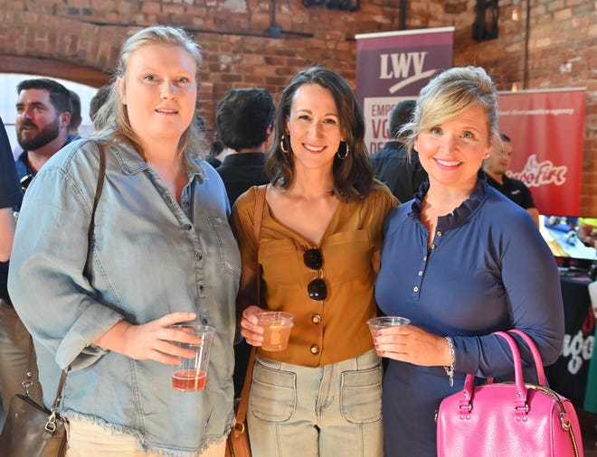 Kristen Guifoos, Allison MIller, Helen Campbell, at the West End Social networking event at New Realm Brewing Co. in Downtown Greenville. Young professionals in the Greenville area connected with West End business owners and community leaders over delicious food and drink. Partners for the event included RingoFire, TALK Greenville magazine, Modal Coffee & Hostel, Corsica Technologies, Greenville Bike Taxi and Clayton's Deli.