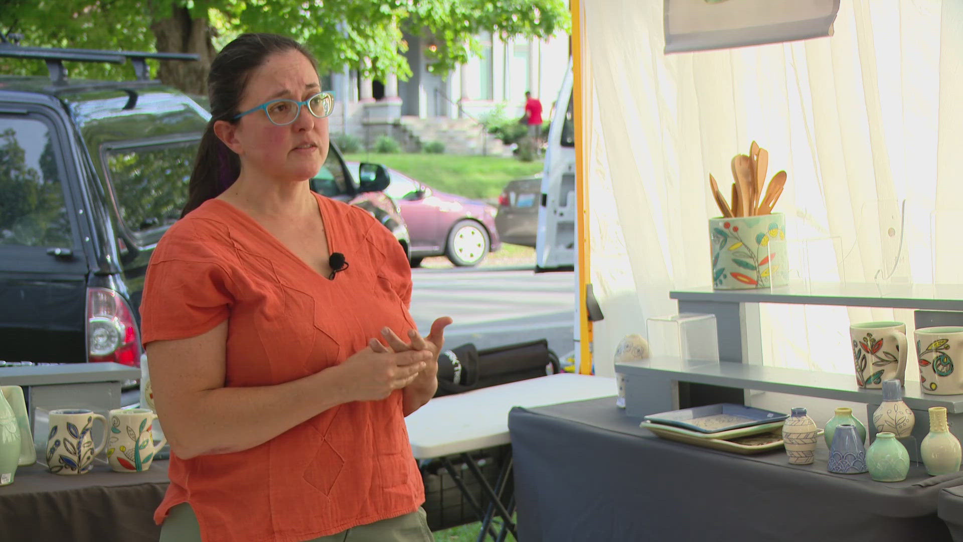 Asheville artist Maria Andrade Troya traveled up through Greeneville, Tennessee on open roads to get to Louisville for the St. James Court Art Show.