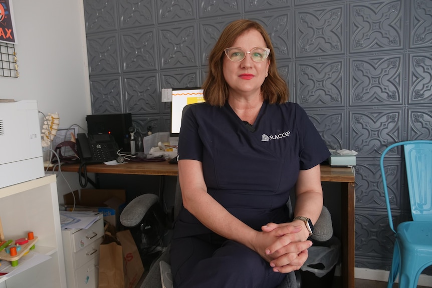 Dr Nicole Higgins sits in her office in Mackay, Queensland