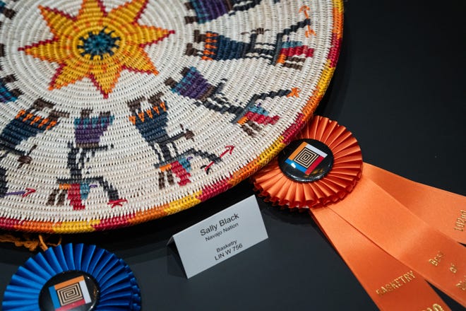 Best of Division A in basketry, a piece by Sally Black, is on display at the Santa Fe Indian Market Best of Show luncheon at the Community Convention Center on Aug. 16, 2024 in Santa Fe, New Mexico.