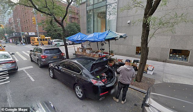 The banana was bought from Shah Alam, 74, who works for $12 an hour at this fruit stand outside Sotheby's auction house on Manhattan's Upper East Side