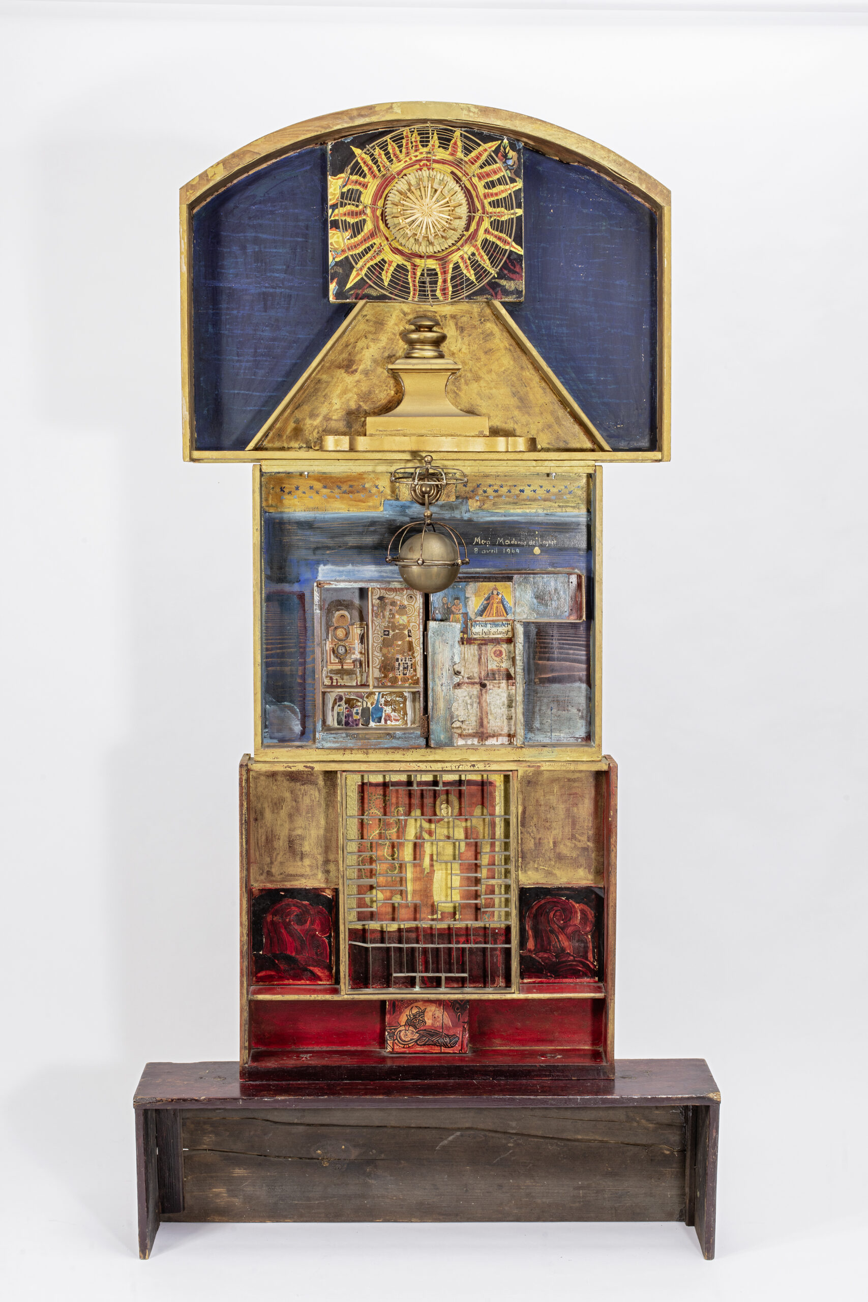 Wipf’s Shrine III (Madonna de Laghet), 1964-68, is composed of multiple wooden cupboards, soap dishes, a disembodied clock base, and a kitchen grill repurposed as a caged, grated window to a medieval-like painted angel.