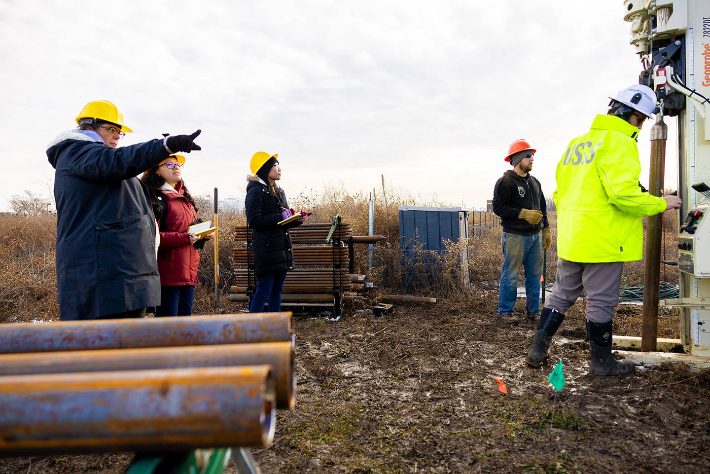 Northern Illinois University professor Melissa Lenczewski talks with students at the site of a monitoring well jointly installed by the university and the U.S. Geological Survey in this November 2023 photo.