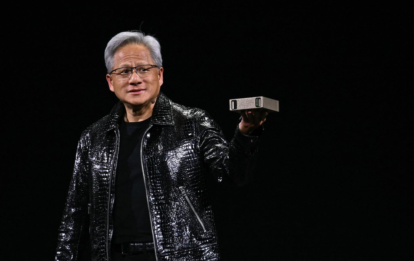 Nvidia CEO Jensen Huang held a personal AI supercomputer during a keynote address at the Consumer Electronics Show (CES) in Las Vegas.