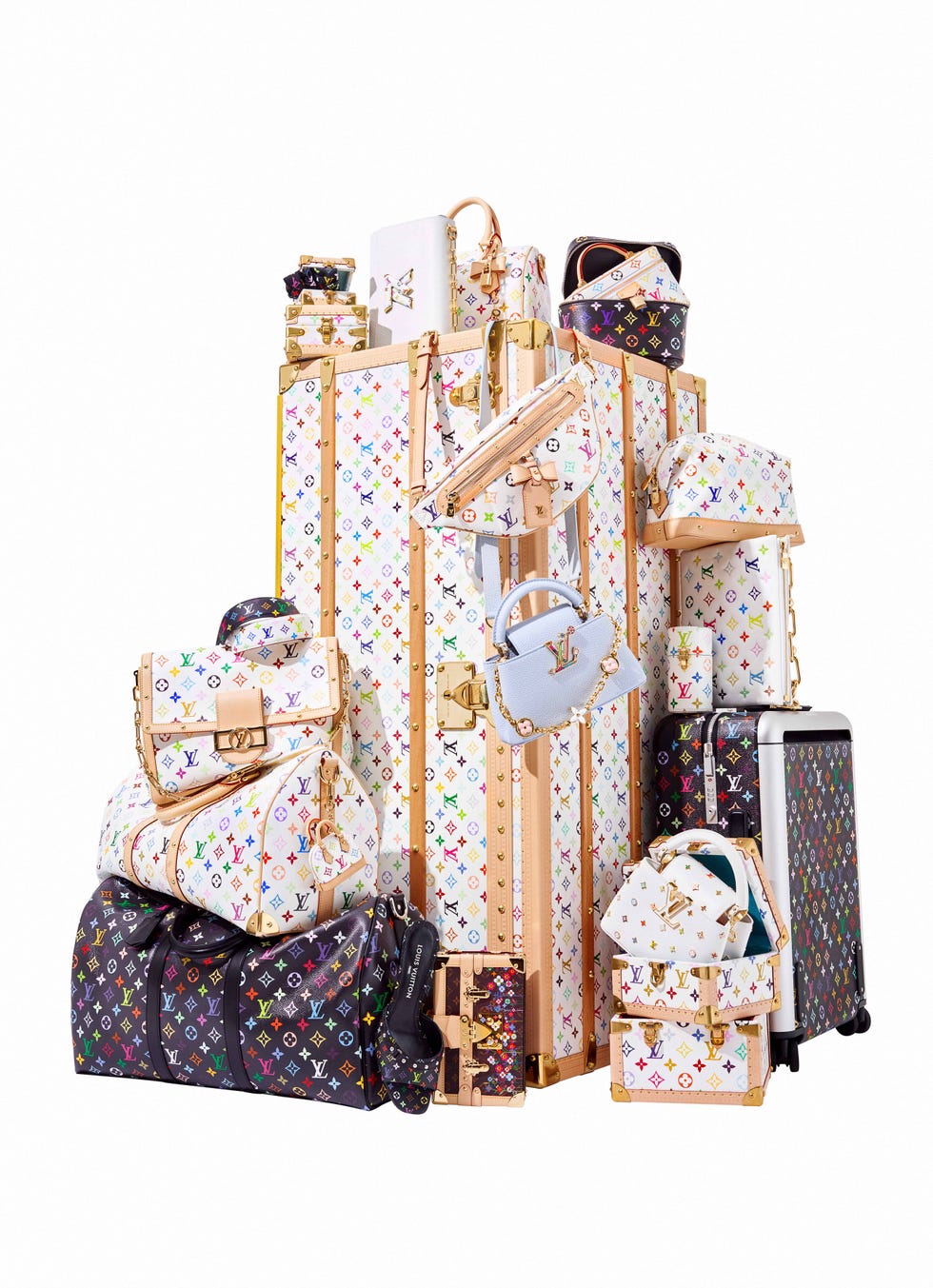 collection of luxury travel bags and suitcases by louis vuitton arranged artistically