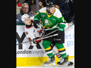 Cam Allen of the London Knights smashes into Ethan Czata of the Niagara Ice Dogs during their Ontario Hockey League game at Canada Life Place in London on Friday Jan. 3, 2025. Derek Ruttan/ The London Free Press