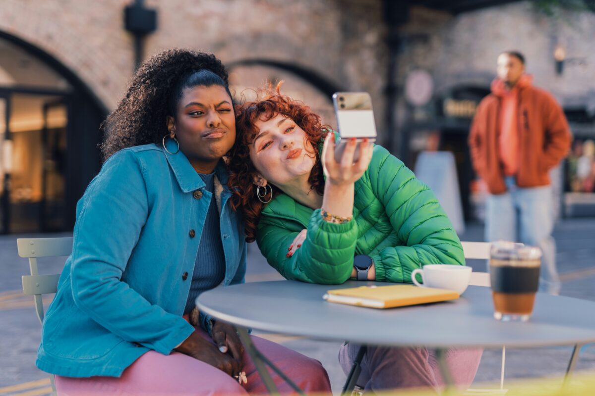 What Is RedNote? pictured: friends using their phones