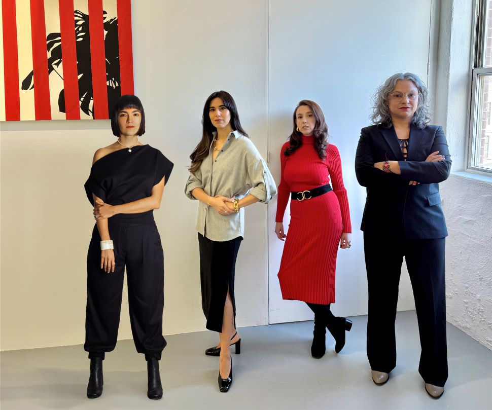 Four women standing