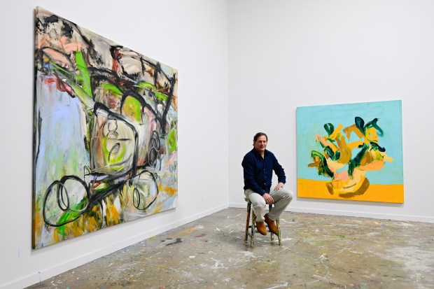 Artist Will Day poses for a portrait in his studio...