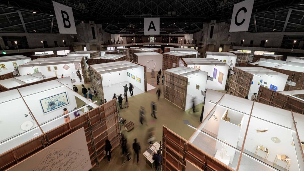 Photo from above of an art fair with booths