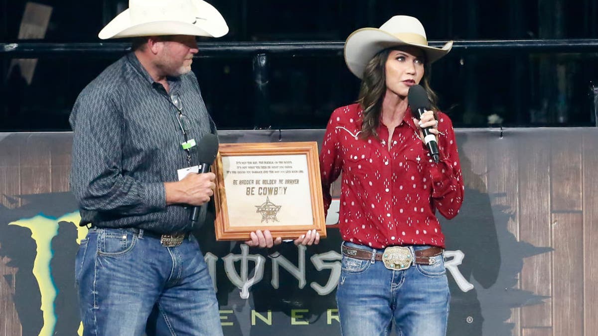 Kristi Noem in 2020 at rodeo receiving award