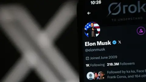 Getty Images A phone showing Elon Musk's X account.