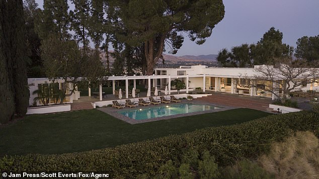 The house's recognizable white pillars were beautifully shot in the pop star's visual