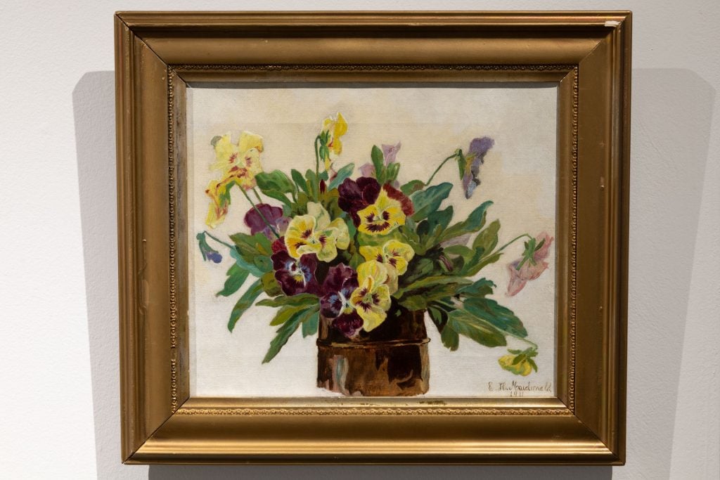 a painting of some yellow and purple flowers in a pot against a white ground